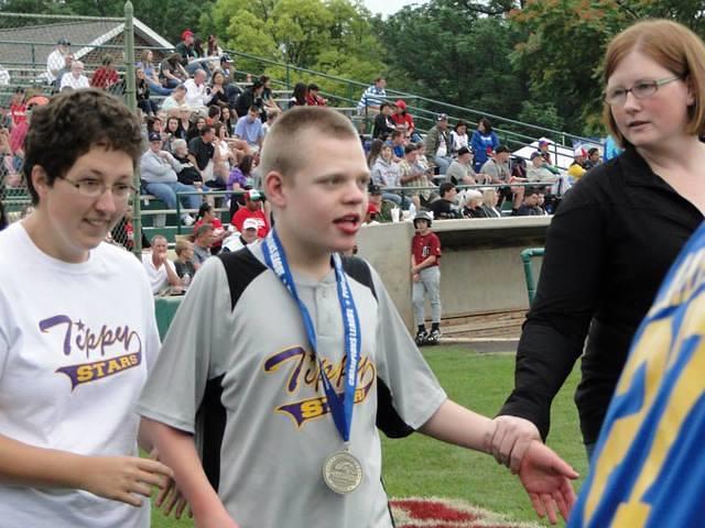 Getting his medal from the Colt World Series.