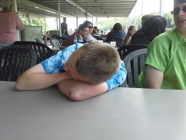 Asleep on the riverboat cruise.