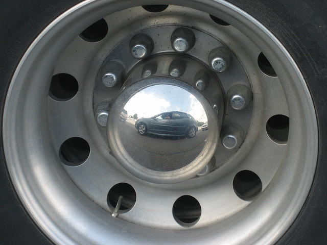 This hubcap was on a car next to us stopped on I-65.  That's our car in the reflection!