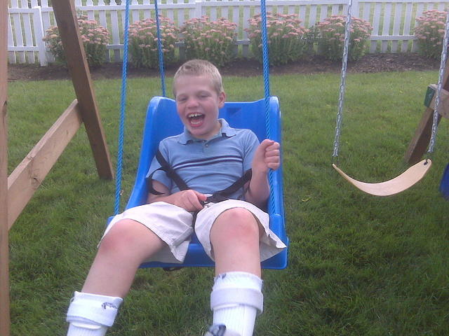 Samuel loves his new swing!