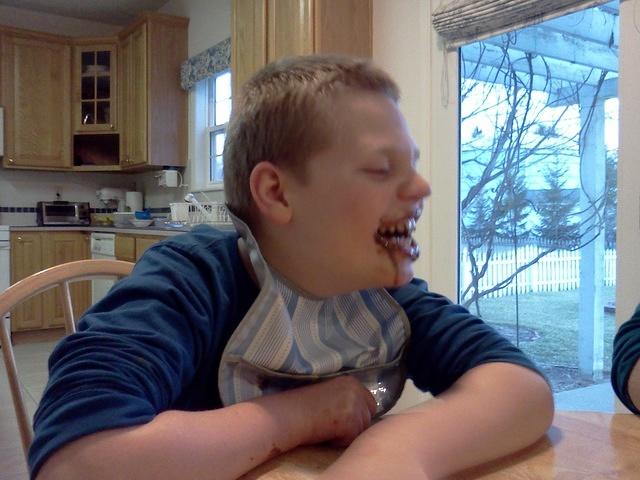 I'm not sure what Samuel is eating here, but it's obviously chocolate and messy!!