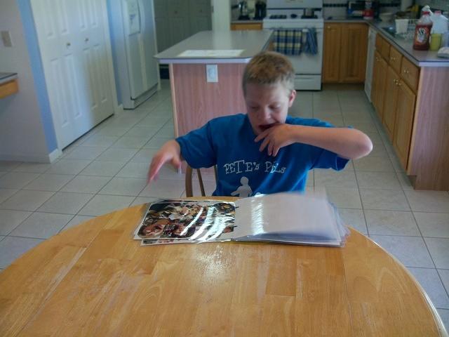 Look! I'm reading a book on my own!