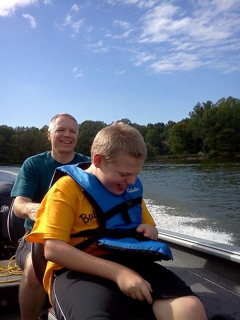 He loved his ride on the powerboat!