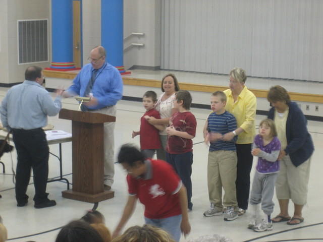 Samuel about to receive his award for Best Smile.
