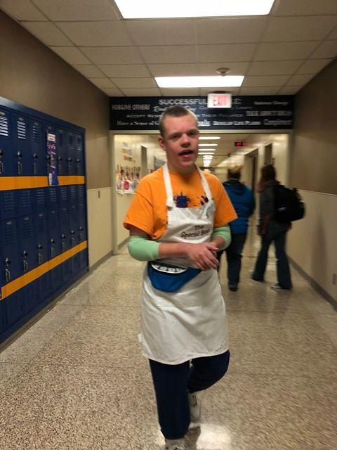 Samuel making coffee deliveries at Harrison High School.
