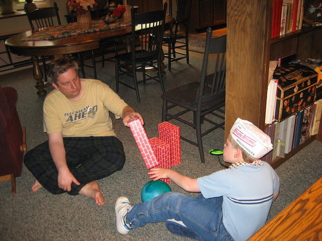 Adam and Samuel playing ball.
