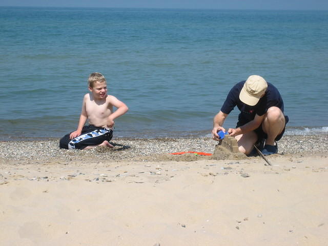 Dan and Samuel on the beach.