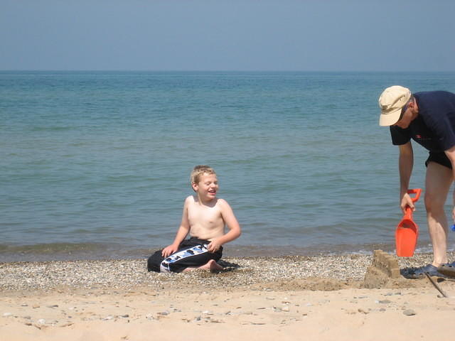 Dan building on the beach under fire from Samuel.