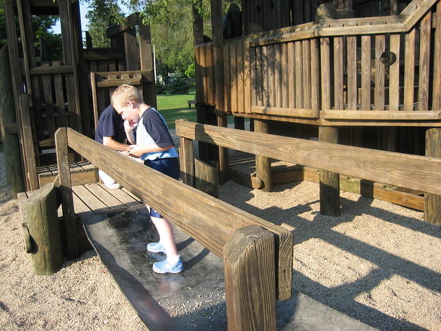 Samuel on the bridge at the Kids Corner playground.