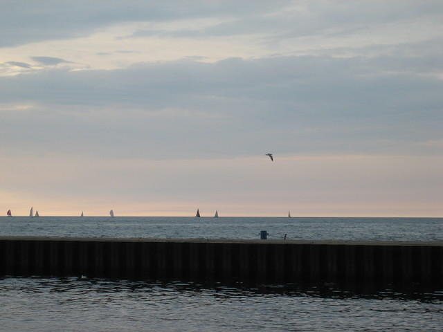 Sailboats on Lake Michigan just before sunset.