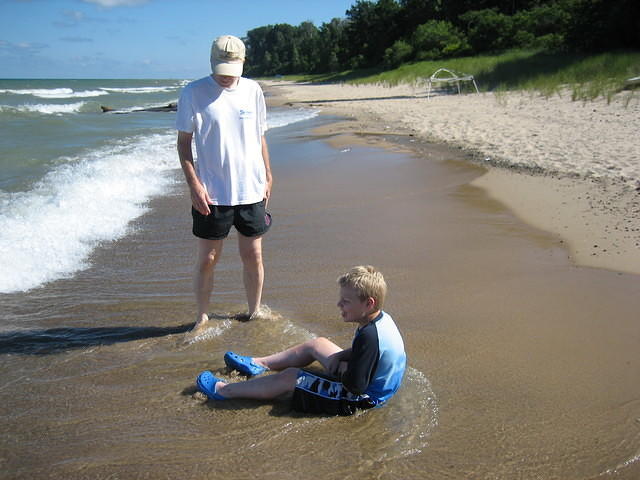 Dan and Samuel at the water's edge.