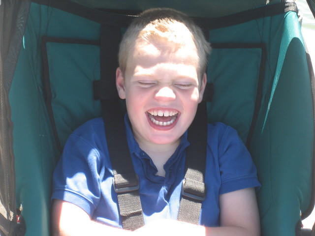 Samuel likes the spray from the waves crashing against the walkway.