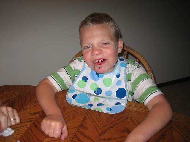 Samuel eating fresh cherries -- while we work out the proper look for his next horror film.