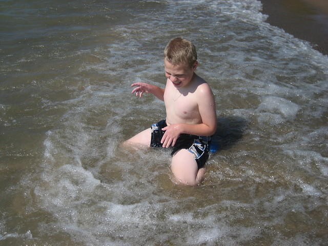 Samuel could not get enough of the waves.