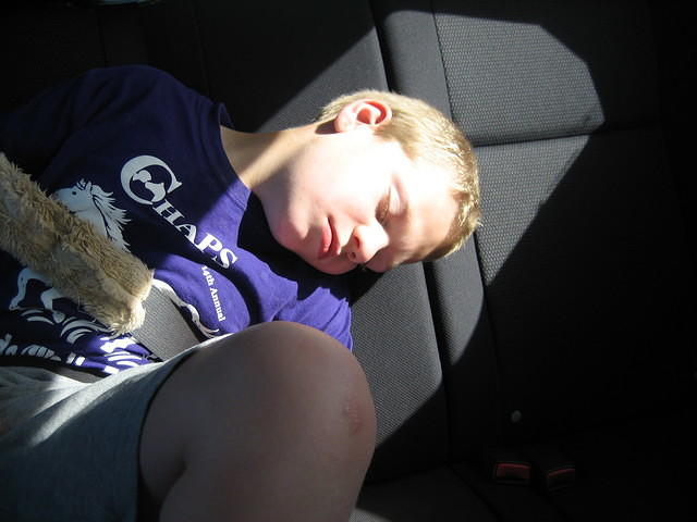 Samuel taking a power nap on the way.
