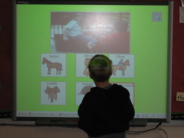 Samuel at the SmartBoard in his class.