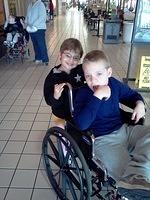 Samuel getting pushed by one of his favorite people!