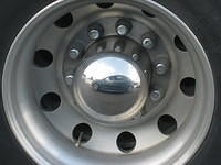 This hubcap was on a car next to us stopped on I-65.  That's our car in the reflection!