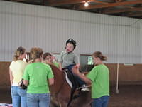 Samuel at PEAKs horse-back riding lesson.