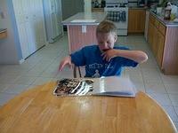 Look! I'm reading a book on my own!