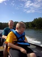 He loved his ride on the powerboat!