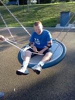 Samuel is really at Physical Therapy and we are paying big bucks for him to swing on this swing!