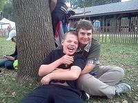 Samuel and Kathy at the Feast of the Hunter's Moon with his class.