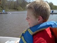 On the paddle boat.