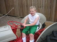 He loved sitting on the tractor!