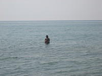 Kathy and Samuel in the water.