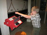 Samuel reading one of the displays at the Michigan Maritime Mueseum.