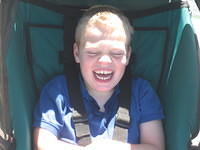 Samuel likes the spray from the waves crashing against the walkway.