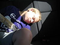 Samuel taking a power nap on the way.